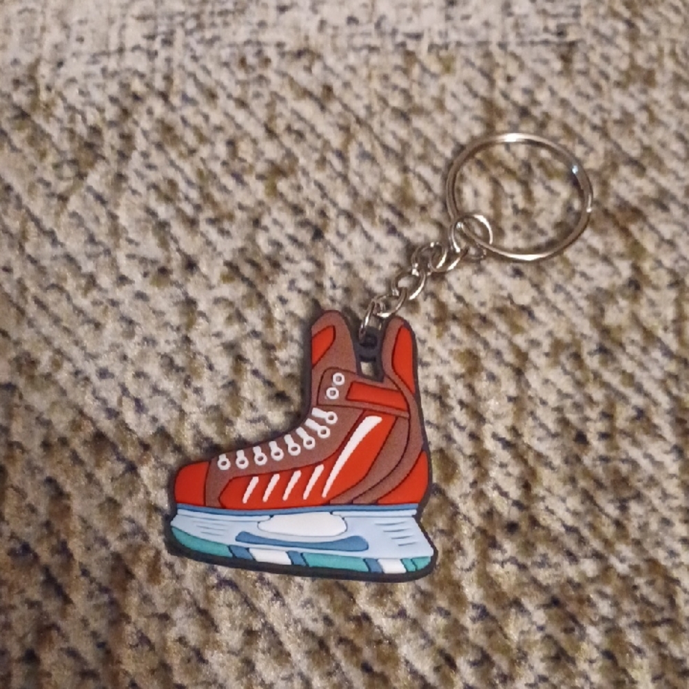 4/$60 New Red Ice Skate Keychain